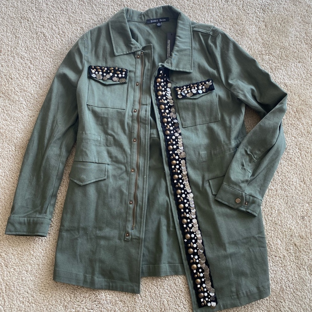 Military style jacket, green with black, gold and silver detailing.